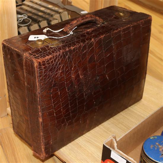 A crocodile skin suitcase, Barkers, Kensington